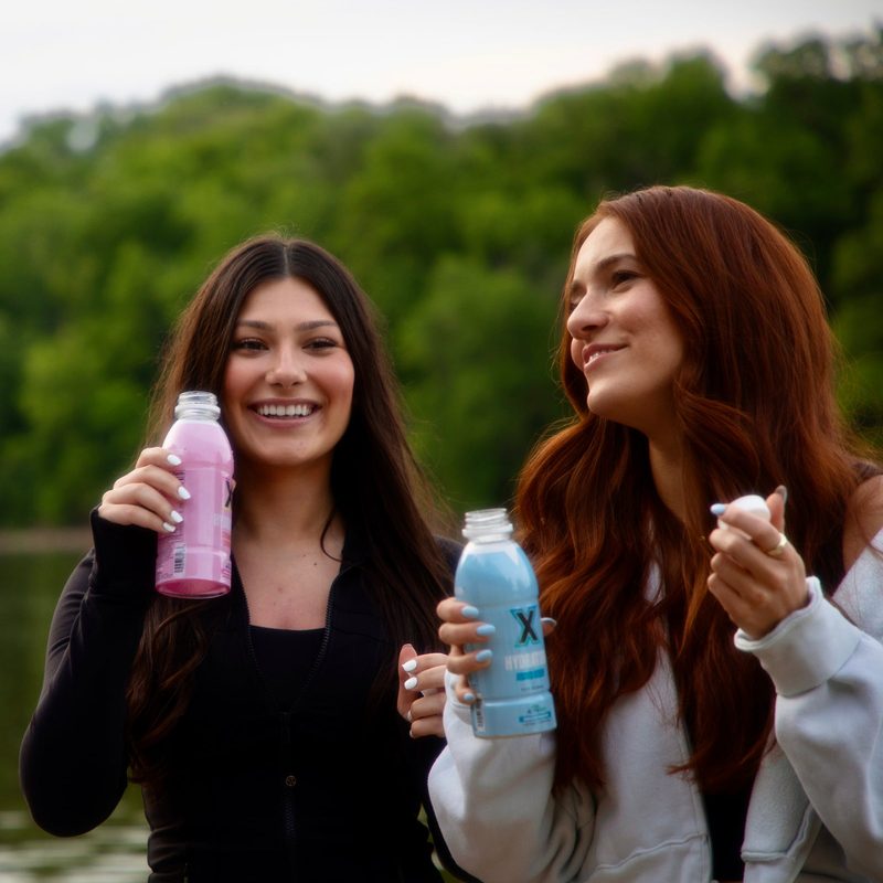 Two friends with X Hydration